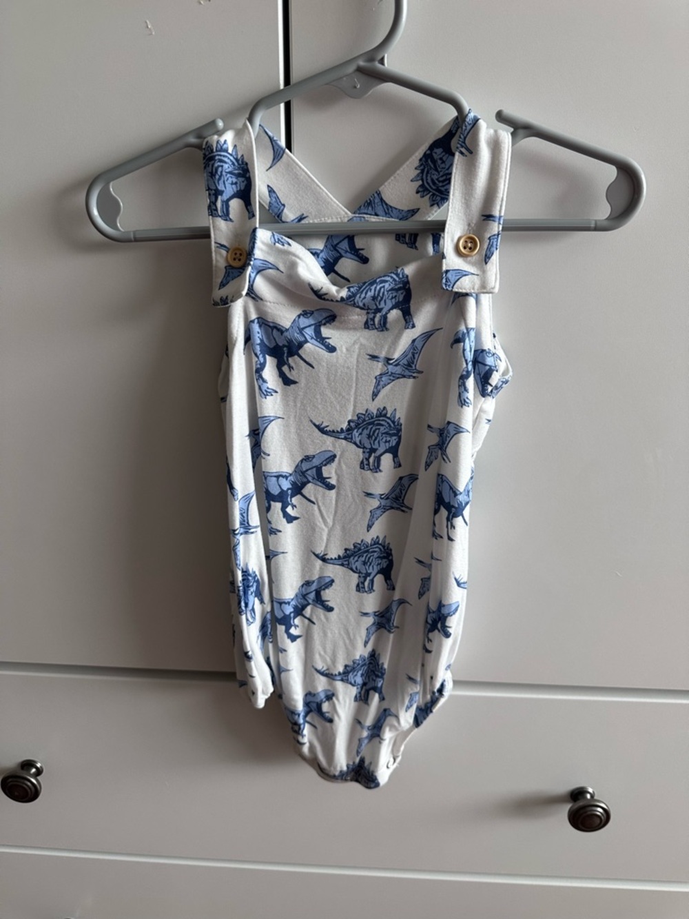 kate quinn White and Blue Dinosaur Print One-Piece Bodysuit